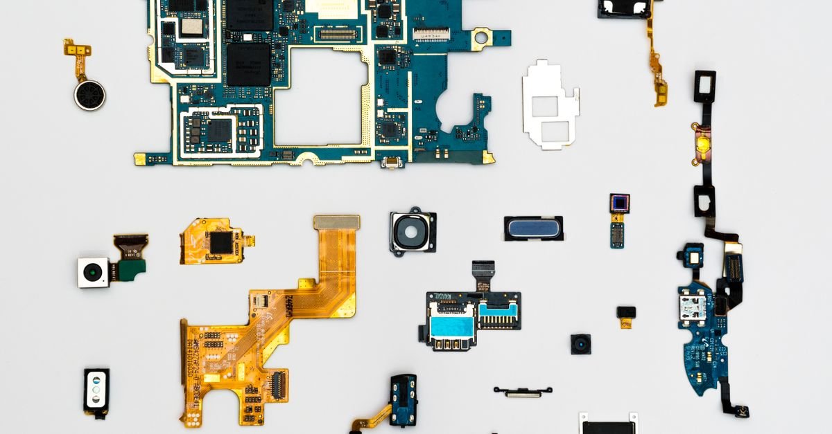 Exploded view of smartphone components showcasing intricate technological design.