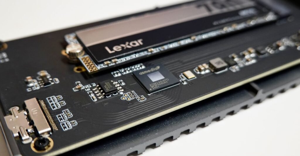 Detailed view of a Lexar NVMe SSD mounted on a circuit board, highlighting electronic components.