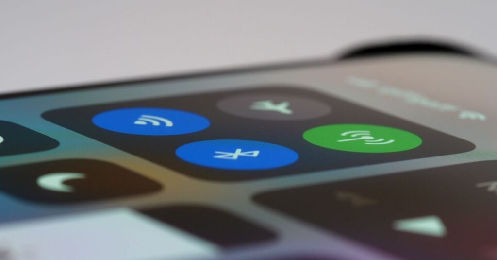 Detailed view of a smartphone control center showing wireless icons, perfect for tech-related topics.