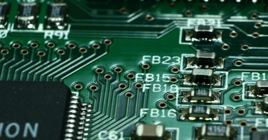 Detailed macro view of a circuit board showcasing microchips and electronic components.
